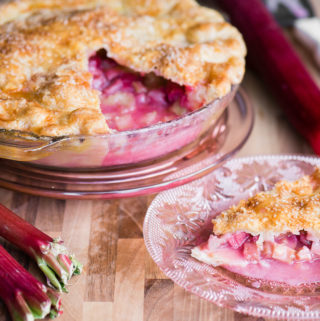 slice of fresh rhubarb pie on pink plate