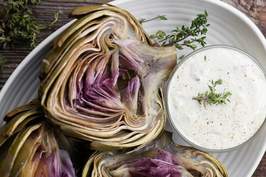 artichoke halves with dipping sauce